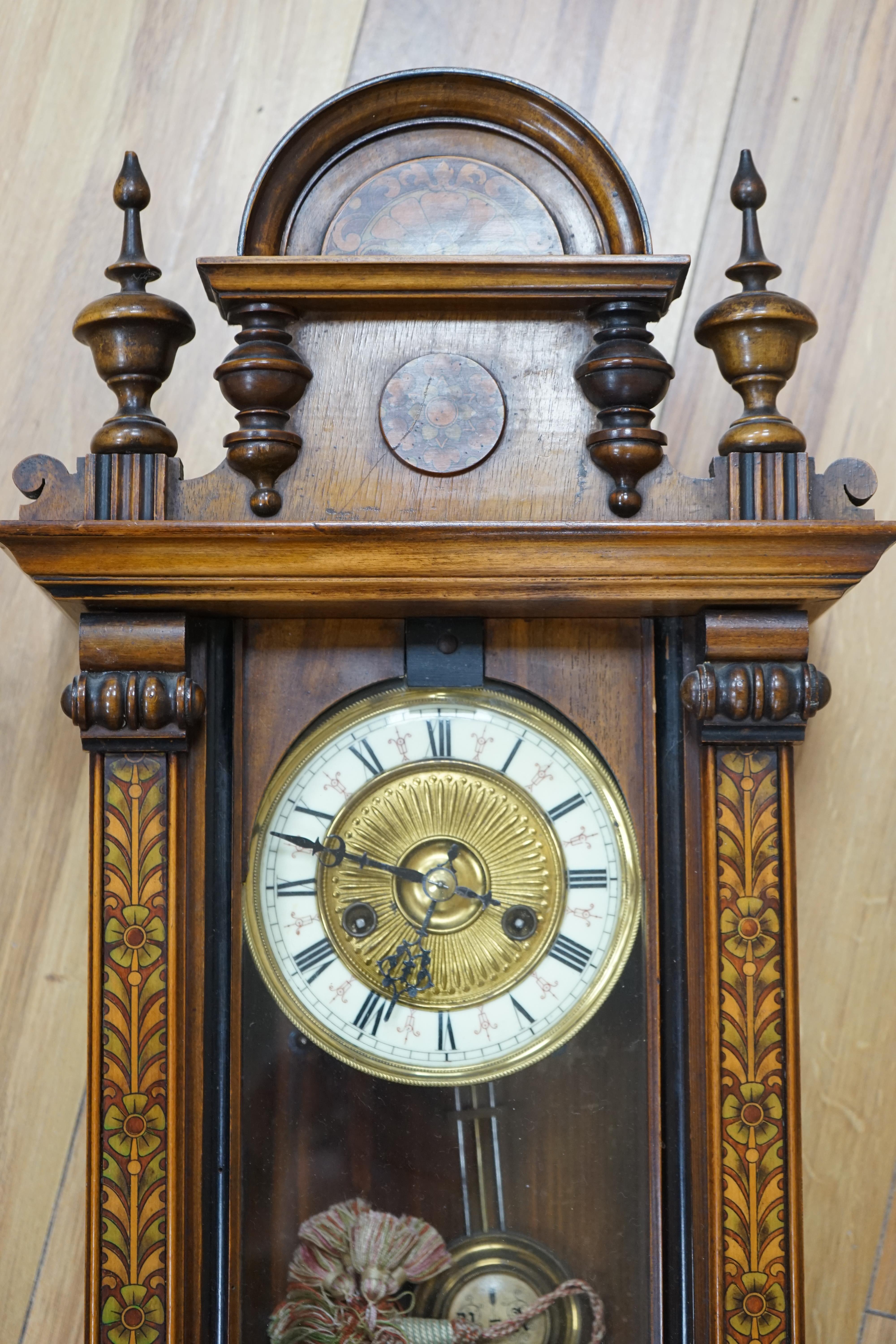 A Vienna style pen worked mahogany wall clock, 61cm. Condition - fair, bottom finial missing, not tested as working